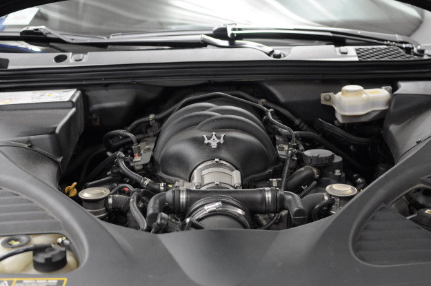2007 Maserati quattroporte sport GT Black custom exhaust stainless fabrication chicago black engine bay trident logo